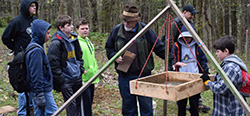 Chapter meber helps scouts at
         Camp Tuscazoar archaeology day
